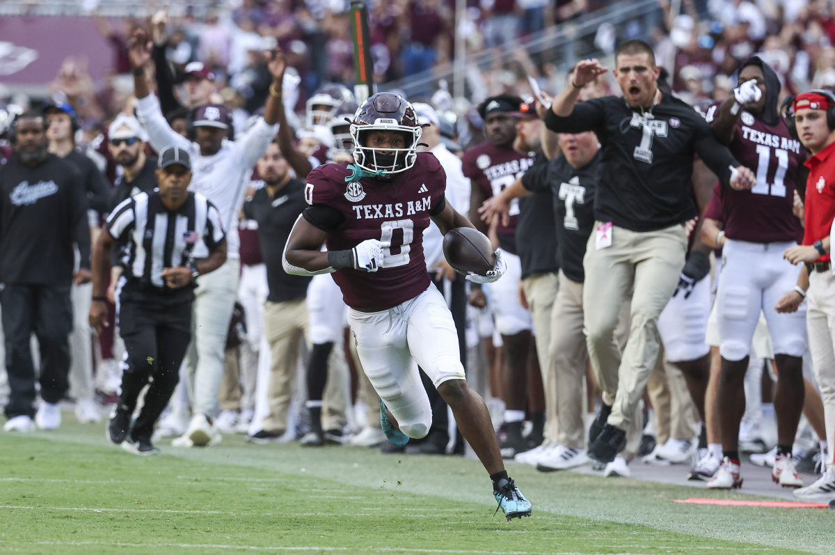 Texas A&M Aggies WR Ainias Smith scoring a touchdown against Alabama. (Photo by Troy Taormina of USA Today Sports)
